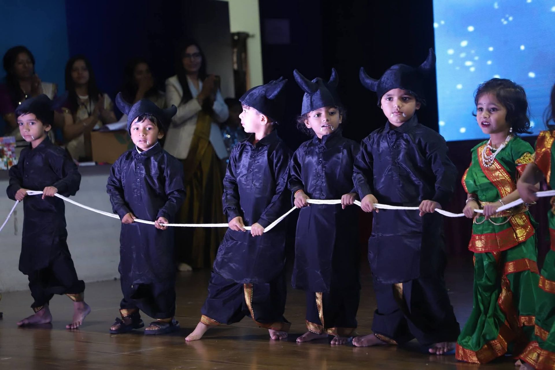 Preschool students performing dance at annual day in Mehsana